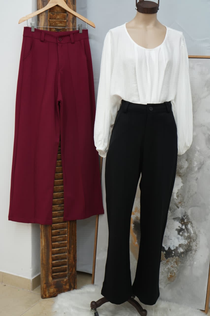 Pantalón punto roma con pinzas boton y pasa cinto