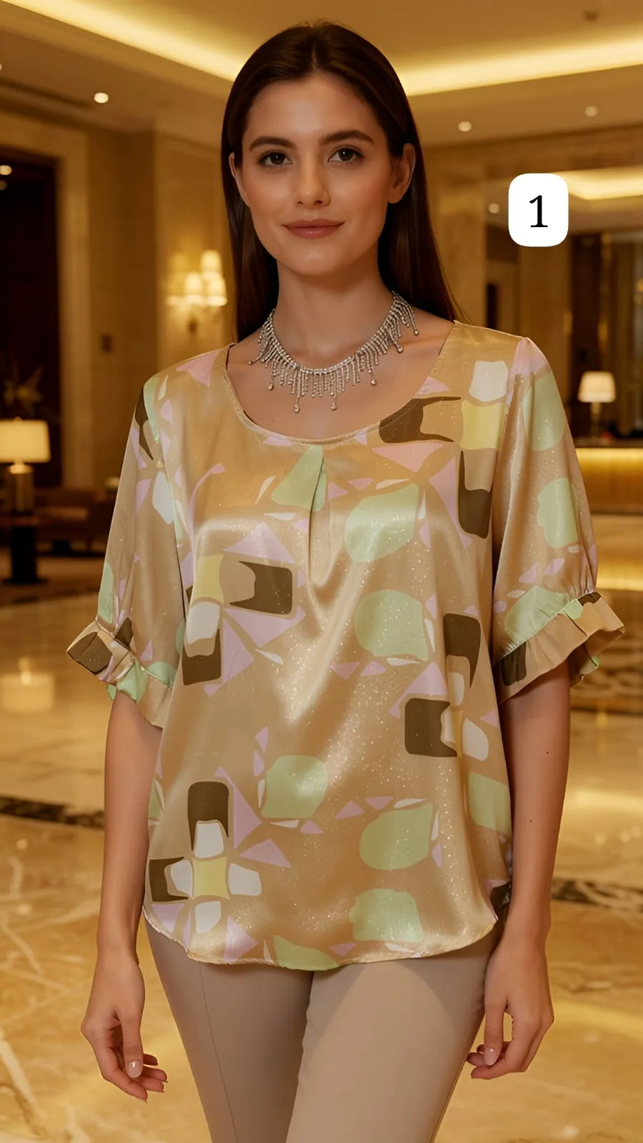 Blusa cuello redondo  con pinzas volados en las mangas Yamile